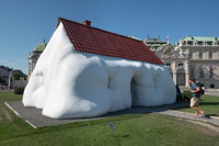 the Fat House by Erik Wurm - an art installation showing how everything in our society is getting fatter. Google 